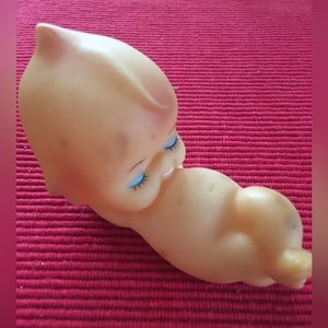 2757 Kewpie Doll Plastic Reclining Kewpie Doll It does have a Few Smudgy Spots